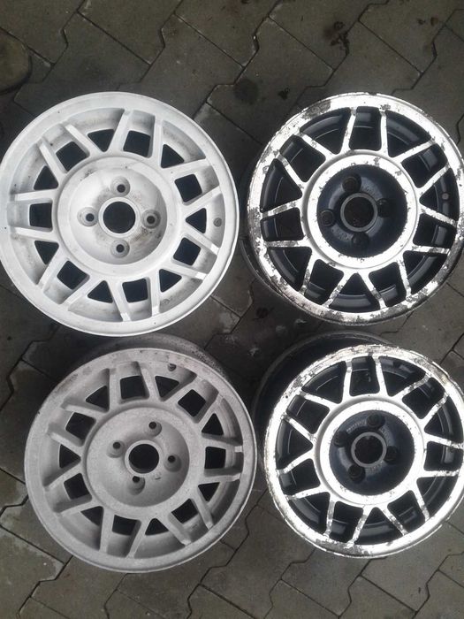 4 Flegi Stalowe VW 14 cali 4x100 ET45 Vento Golf 2 3 Passat B3 B4 Serc
