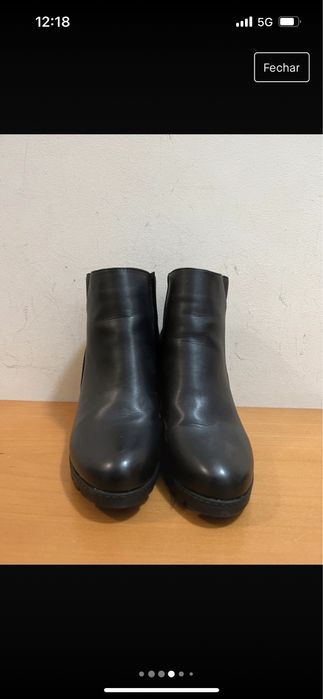 Botas da natura com salto