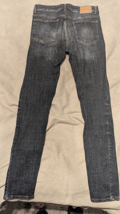 Spodnie jeansy dżinsy Pier One bawełna elastan dziura kolano 34/34