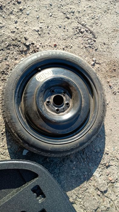 Koło zapasowe Toyota Corolla e21