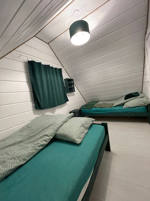 Zielony domek 12 osób basen sauna Pilchy Roś wynajem Mazury