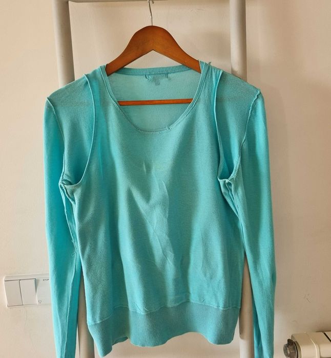 Camisola azul turquesa da marca Antea do El Corte Inglés