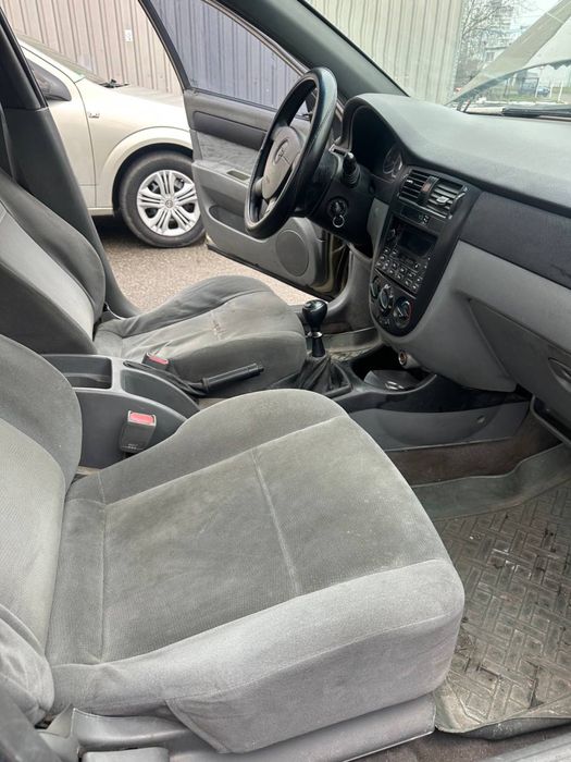 Шевроле Лачетти 1.6 газ бензин