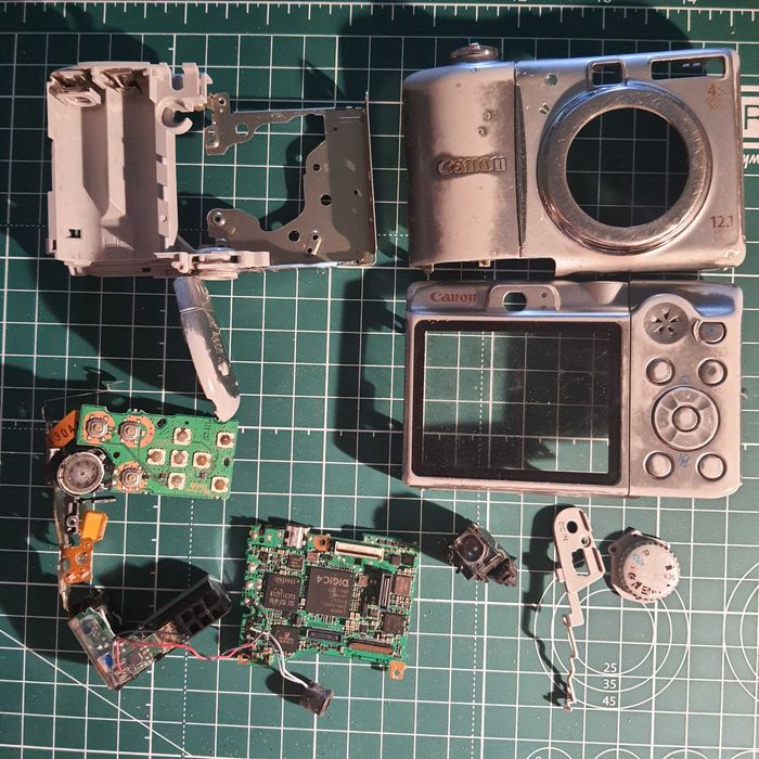 Разборка запчасти цифрового фотоаппарата Canon PC1354