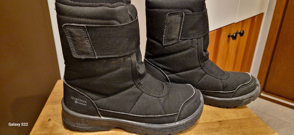 Używane Buty śniegowce czarne  Quechua.R32
Długość wkładki  20cm