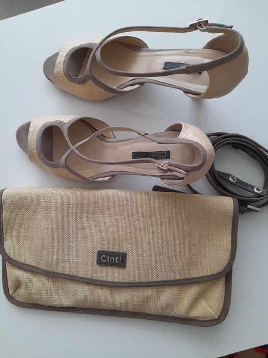 Комплект-туфли,клатч с ремешком. Почти нові, надавались 2 раза.