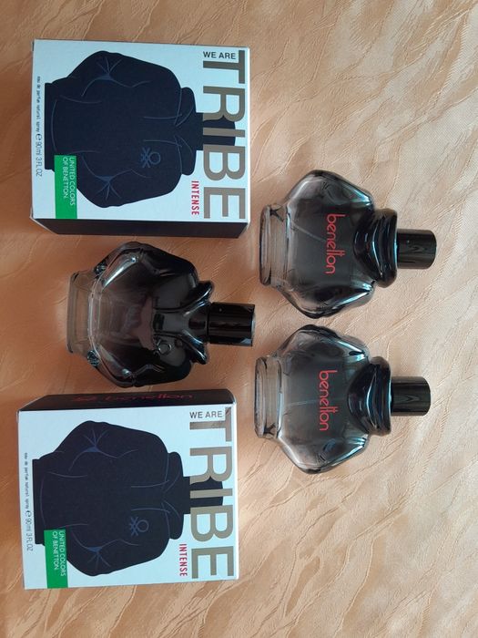Trzy puste flakony po wodzie perfumowanej