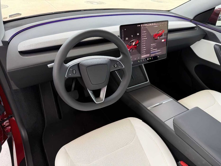 Tesla Model Y      2026