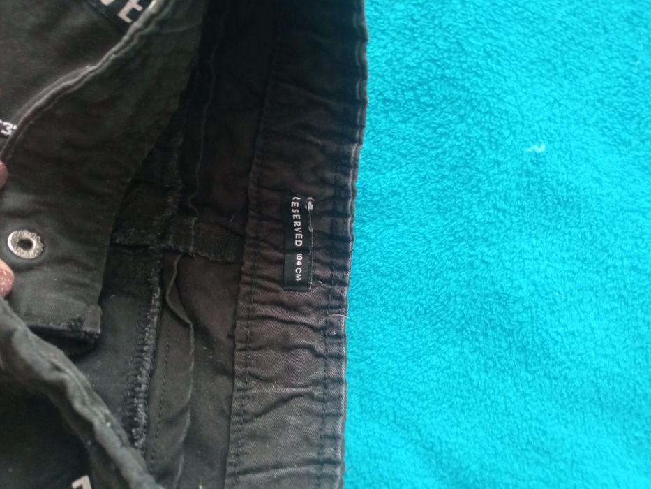 Spodnie jeansowe chłopięce Reserved