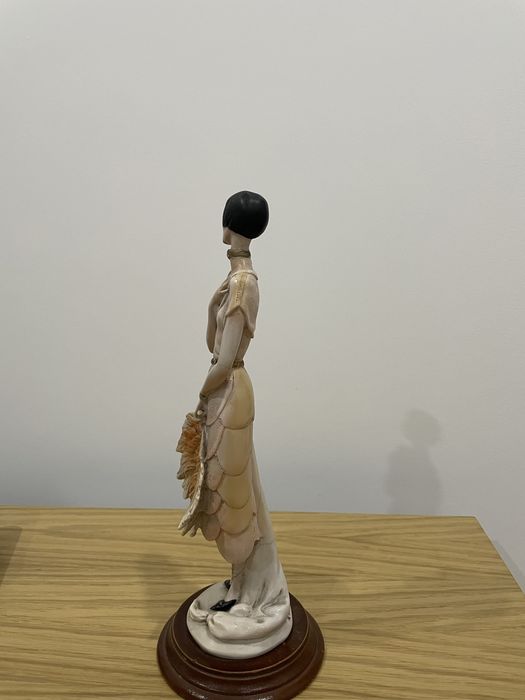 Estatueta de mulher