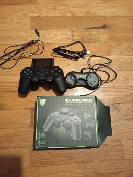 Portable Retrovision S10 gaming console with 500 games64284483823489121