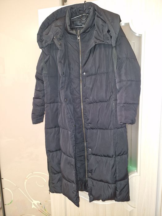 Довге, стьобане дуте пальто .