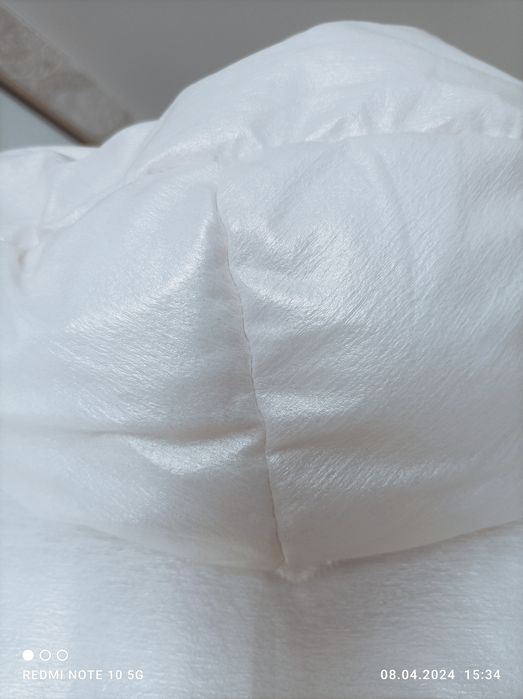 Продам  гарний пуховік фірми EVACANA.р.44