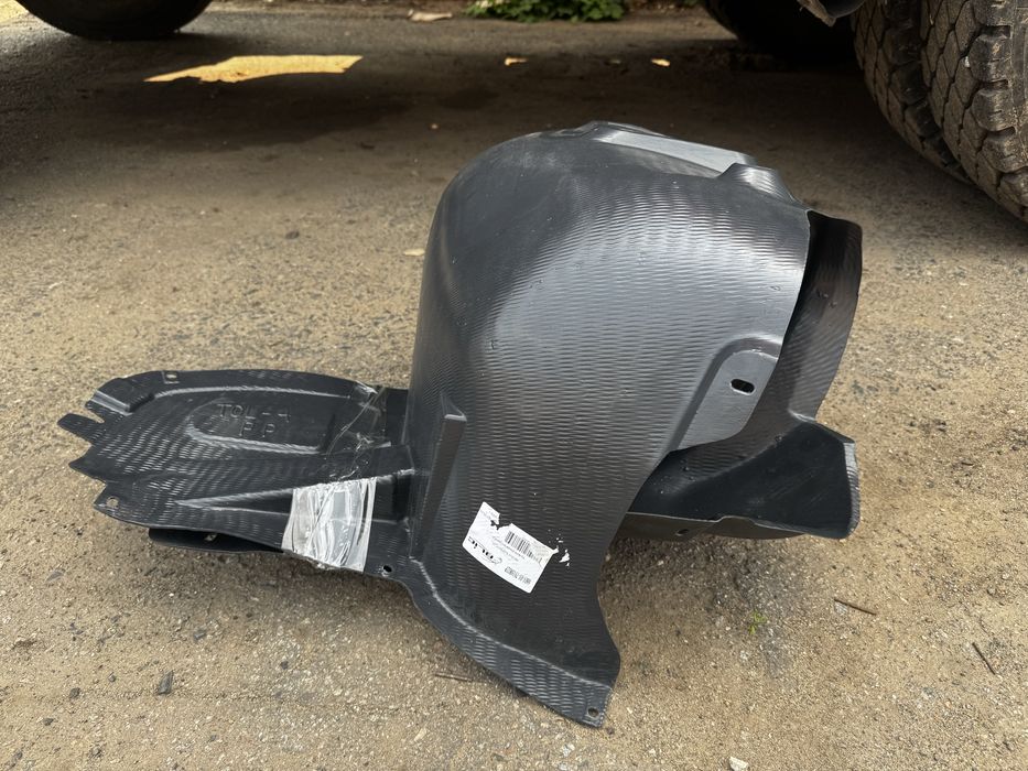 Подкрылок передний левый Skoda Rapid