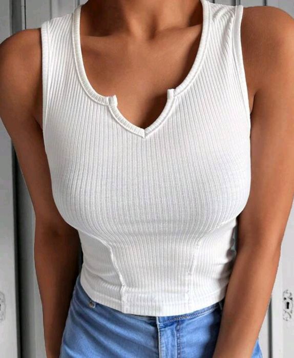 Top biały prążkowany.  Nowy w oryginalnym opakowaniu