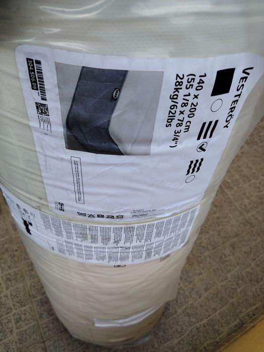 Colchao novo ainda dentro do plástico