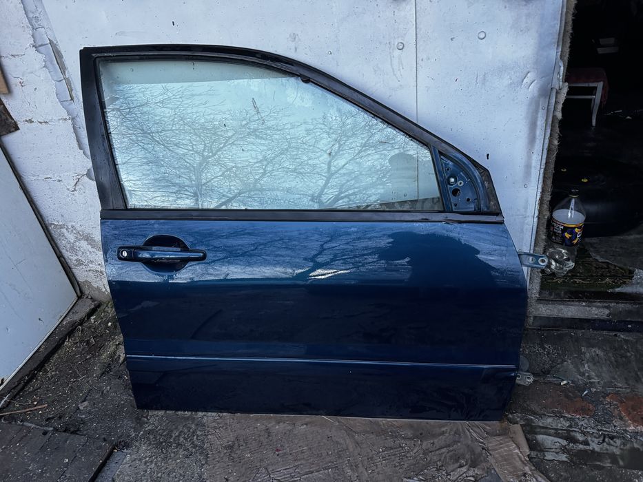 Двери Mitsubishi Lancer 9