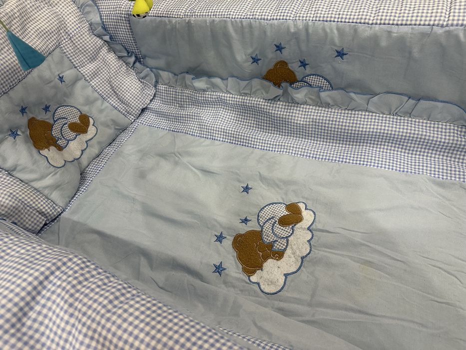 Бортики та ковдра в дитяче ліжечко