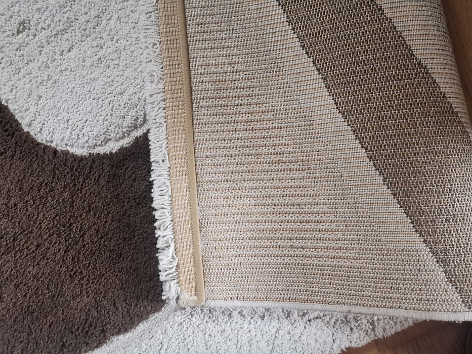 Gruby dywan bialo brazowy