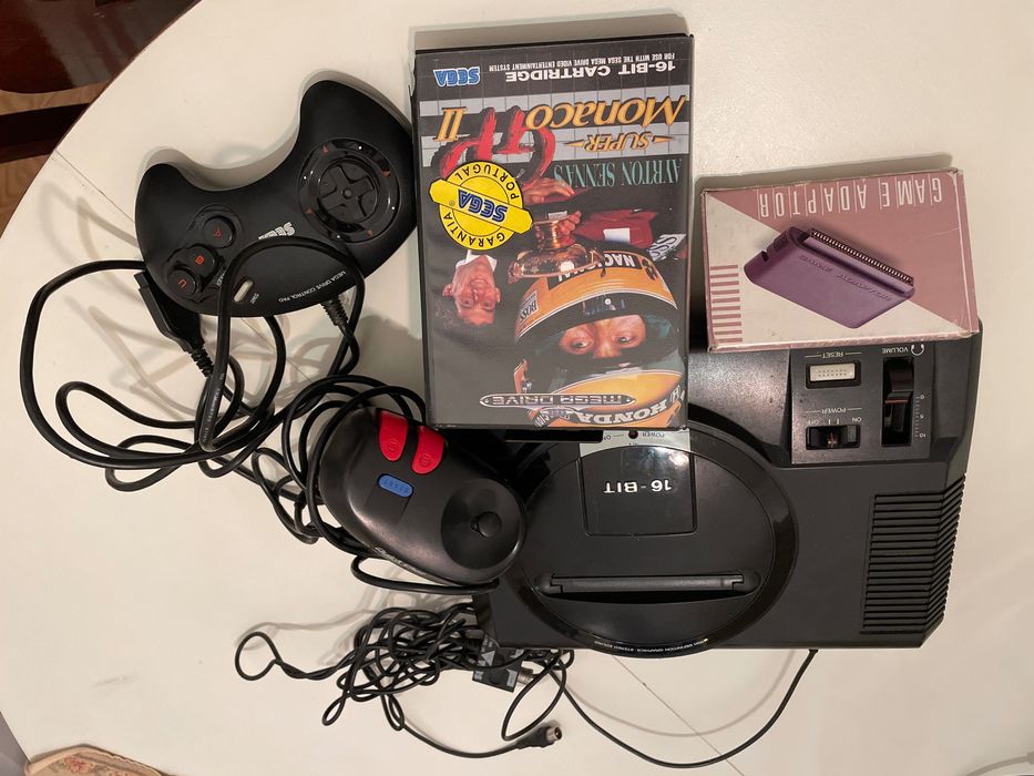 Sega Mega Drive with Game and Adapter64171299369473120