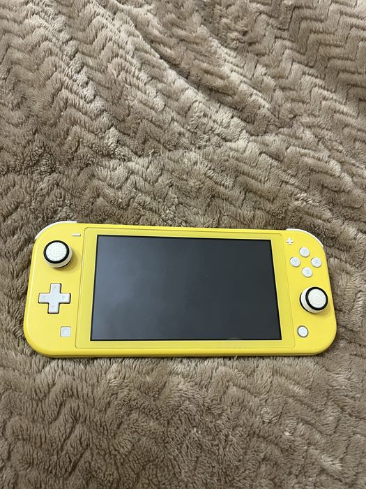 Nintendo Switch Lite + acessórios