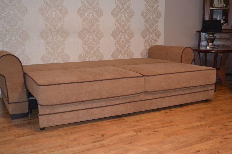 Zestaw wypoczynkowy Kanapa rozkładana + fotel Uszak + pufa - producent