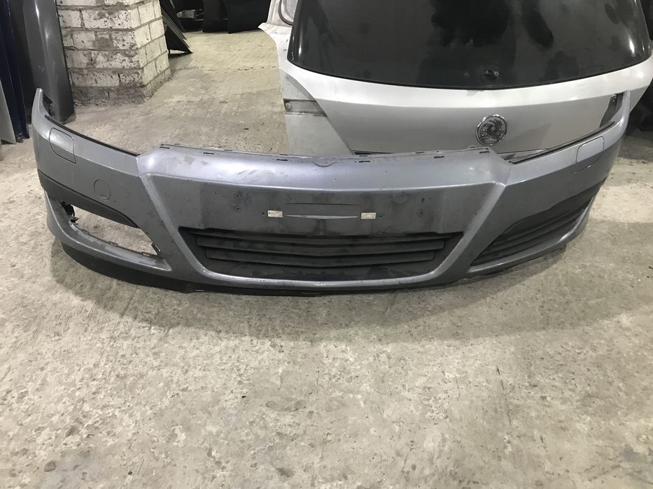 Бампер передний  Opel Astra H  дорестайл