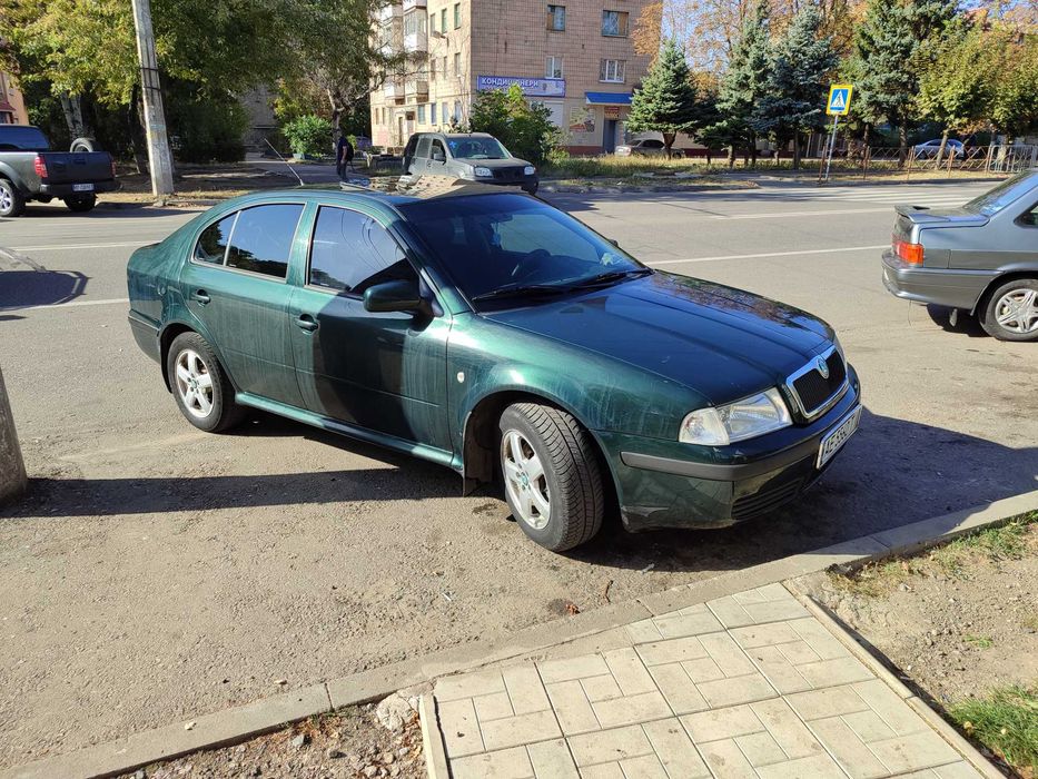 Октавія тур 2.0 газ/бензин