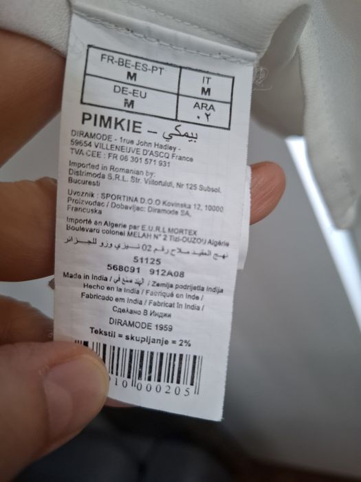 Biała bluzka bez rękawów ciekawy kołnierzyk Pimkie M