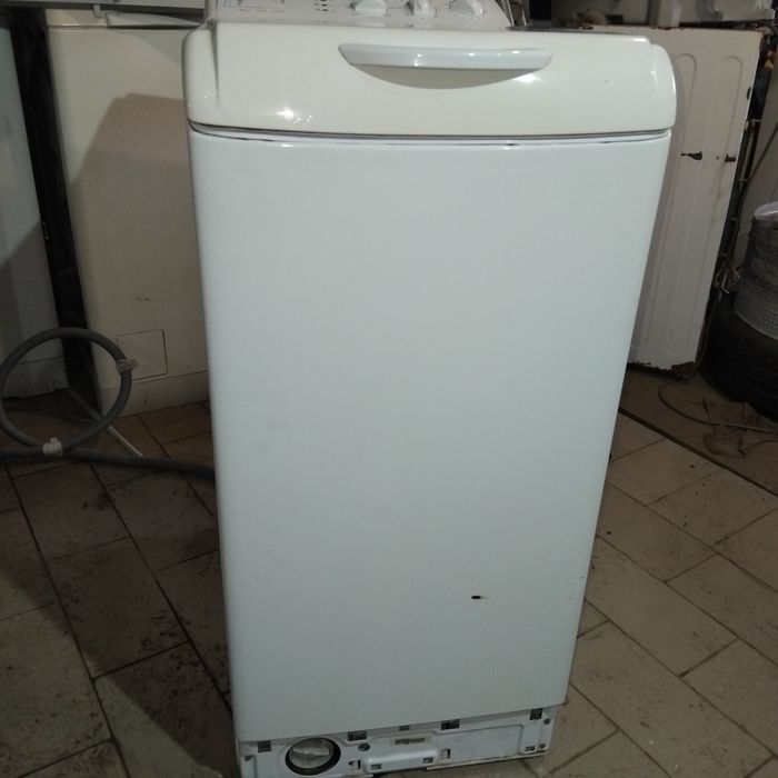 Вертикальная стиральная машина индезит.