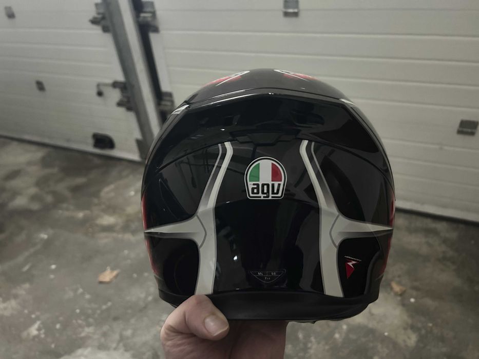 Casaco e capacete de mota