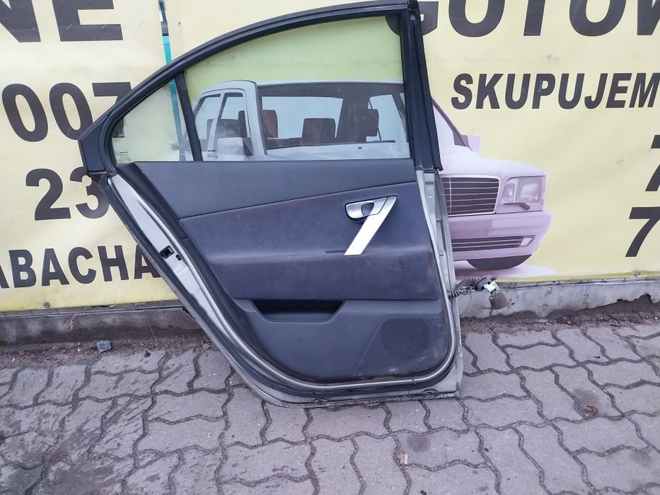 Nissan Primera p12 K30G HB drzwi lewy tył tylne lewe kompletne