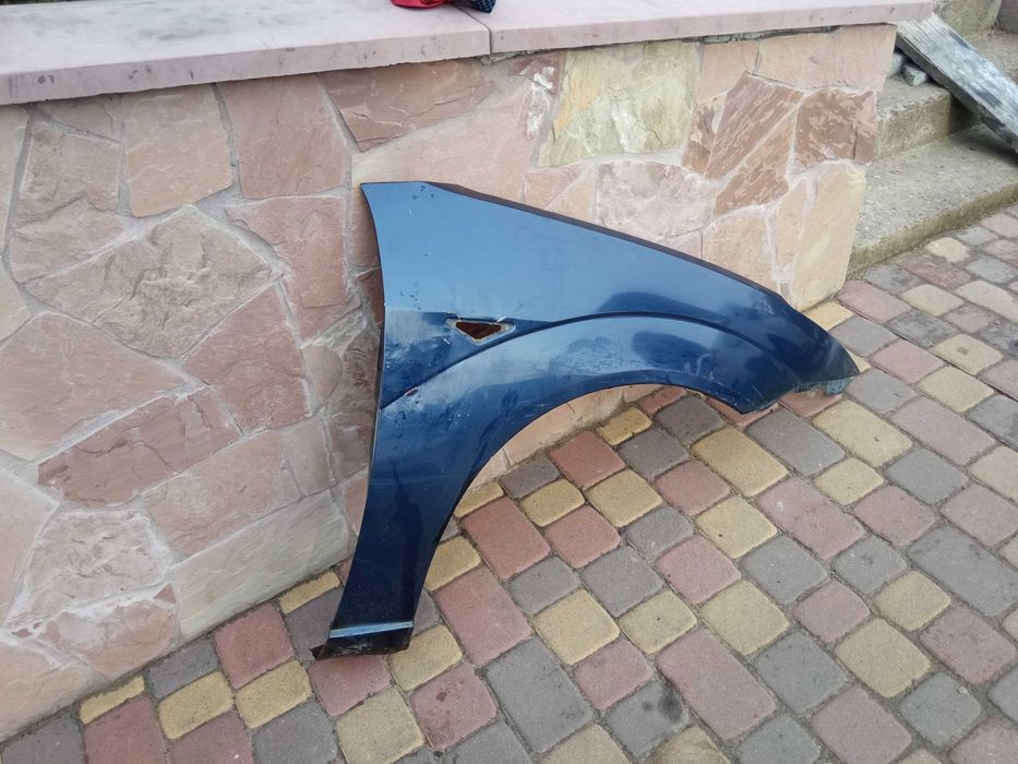 Крило праве переднє пасажирська сторона порізка кузова Форд Фокус Мк1