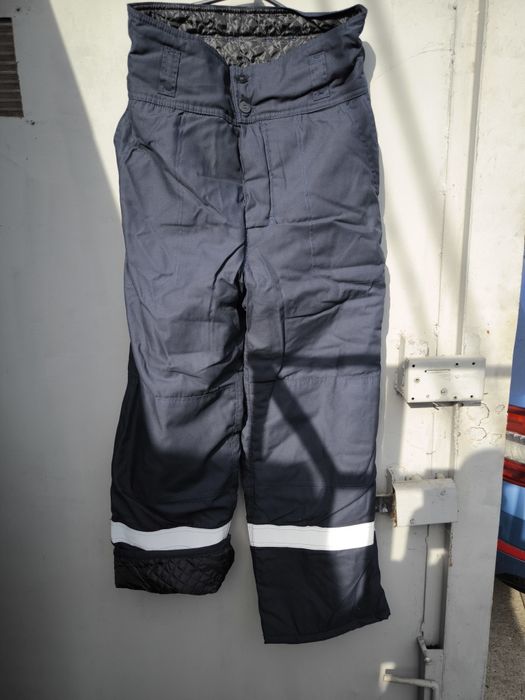 Продам теплые новые штаны