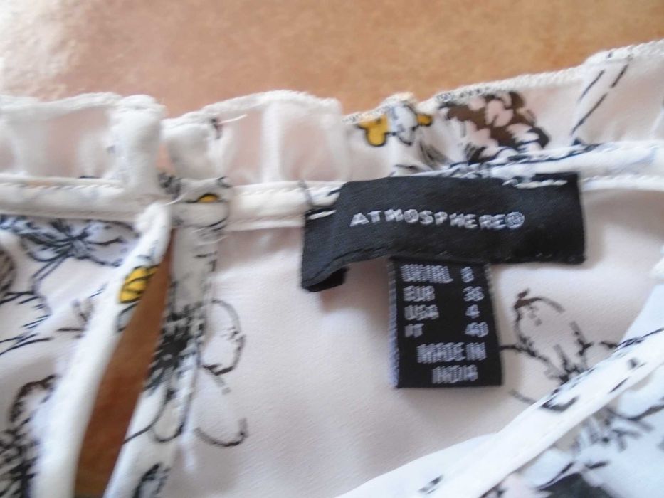 Saldos de loja. Blusa nova em tecido