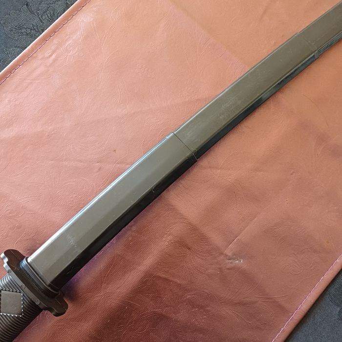 Espada samurai retráctil de plastico