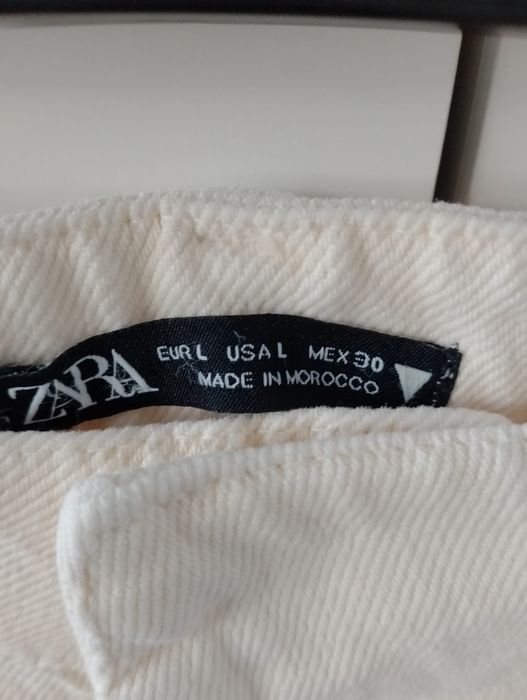 Nowe jeansy szerokie nogawki 44