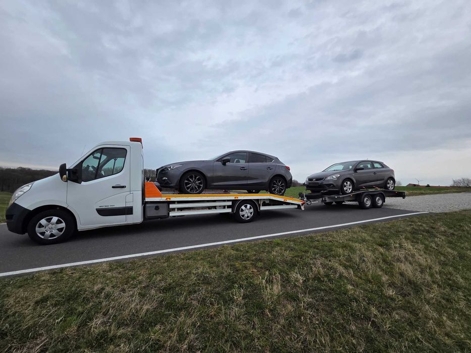 Transport. Holowanie. Autolaweta. Pomoc drogowa.