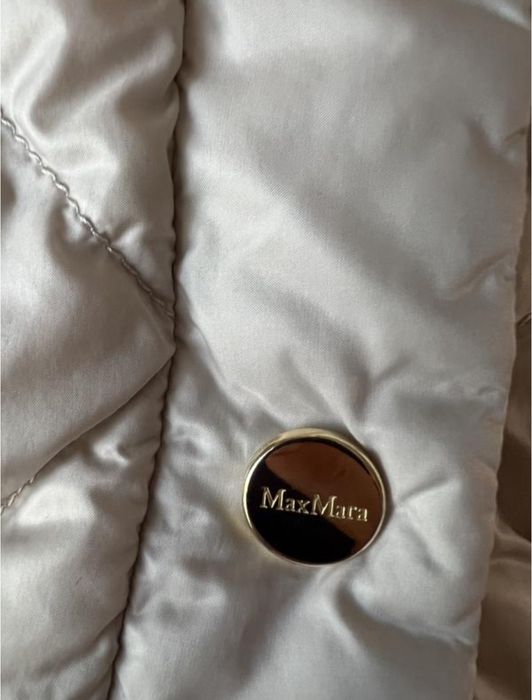 Жіноча куртка пуховик