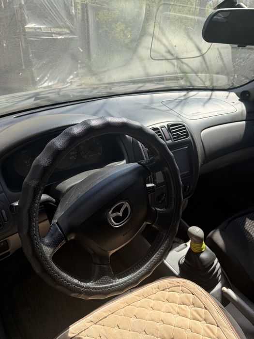 Mazda 323 1998 1.9 бензин