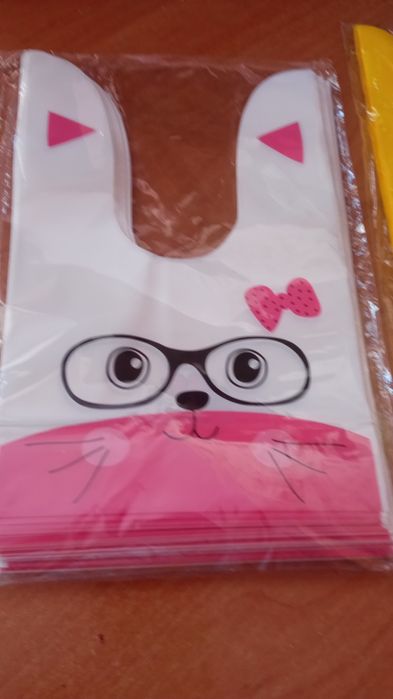 Святкові пакети для подарунків