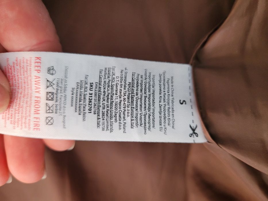 Bezrękawnik brązowy puszek