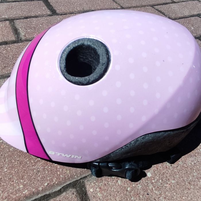 Kask rowerowy dziewczęcy B'TWIN, różowy w groszki z kokardą, 48-52 cm