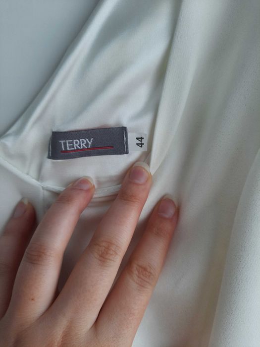 Suknia ślubna w kolorze śmietankowym