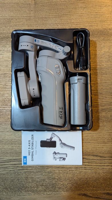 TOKQI M01. Тривісний стабілізатор для смартфонів