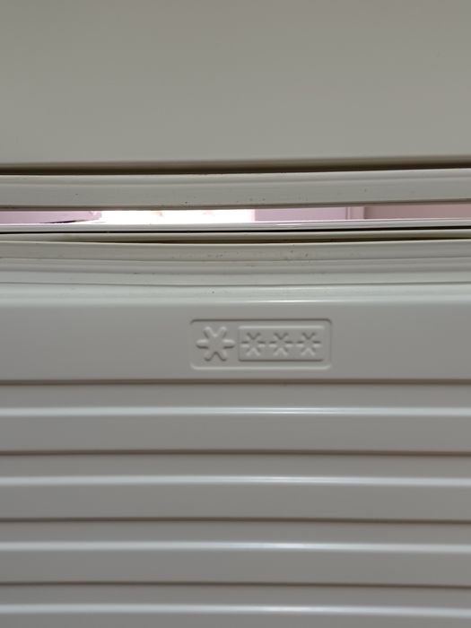 Frigorífico combinado AEG seminovo.