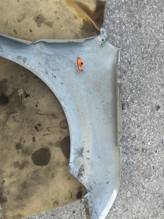 Blotnik przedni lewy ford fusion