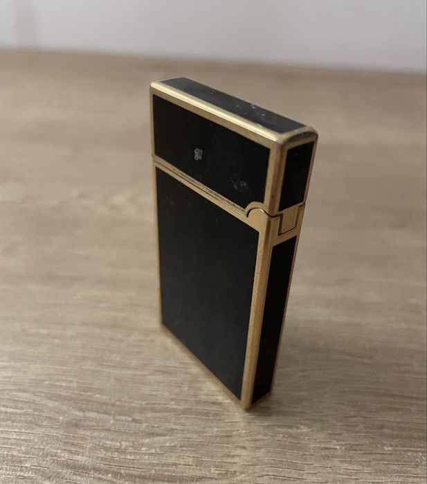 Stara zapalniczka DELTA