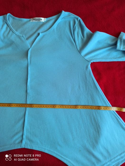 Niebieska bluzka prążek