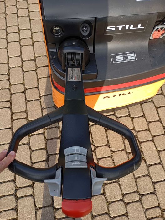 Wózek paletowy masztowy widłowy elektryczny Still